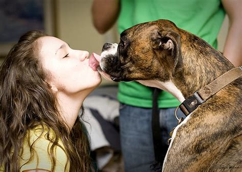 Dog Kisses: Woman French Kisses Big Dog